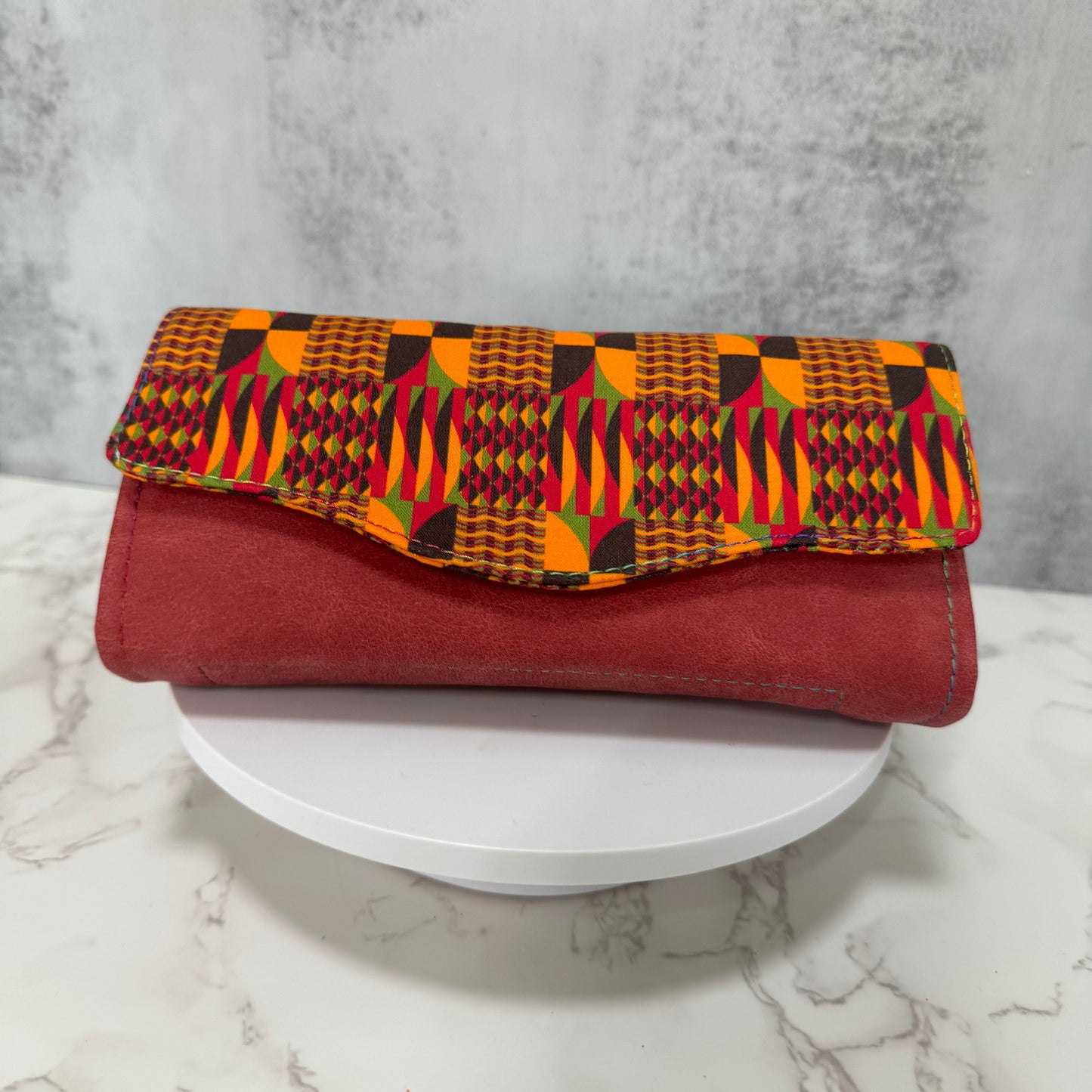 Small zippered wallet with charm