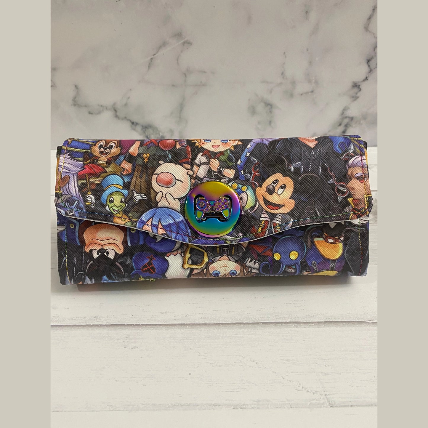 Wallet with gaming controller design